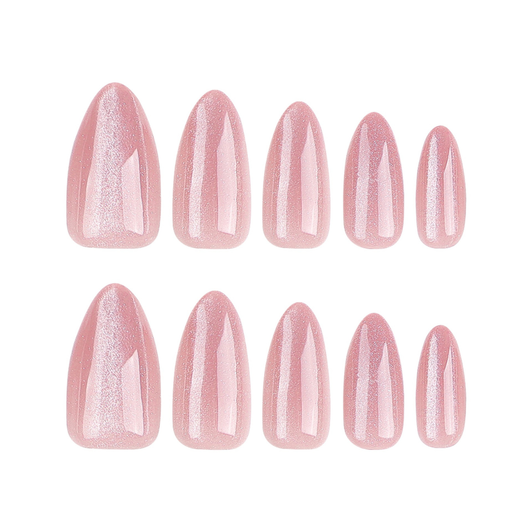 Set of pink glittery nail tips on a white background