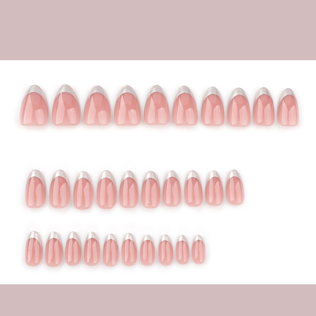 Set of pink and white nail tips on a white background