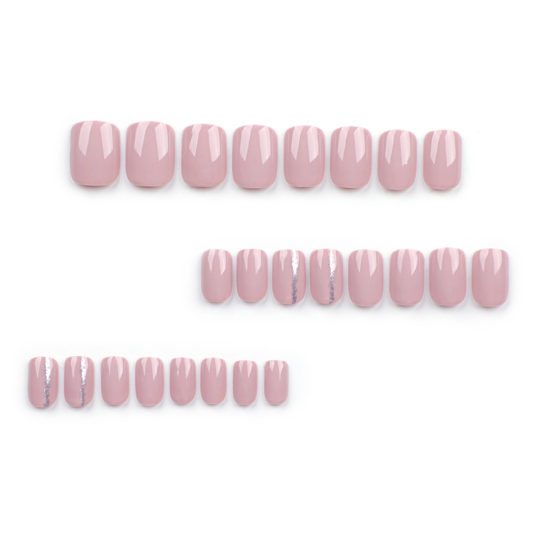 Row of pink nail polish swatches on a white background