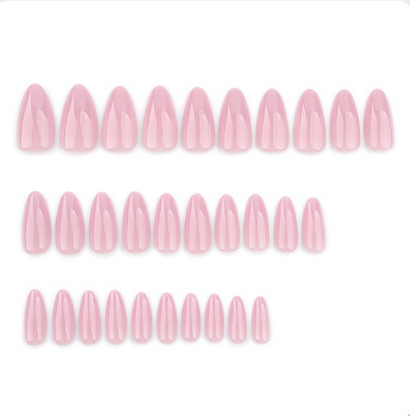 Set of pink nail polish strips on a white background