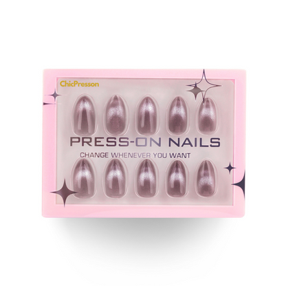 Box of press-on nails with pink packaging and nail images on a white background