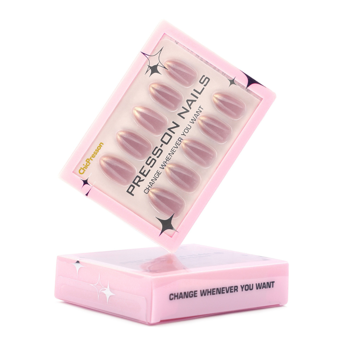 Pink packaging of press-on nails with a white background